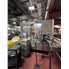 Used Ambec 12 oz Bottle Filling and Palletizer Line