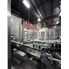 Used Ambec 12 oz Bottle Filling and Palletizer Line